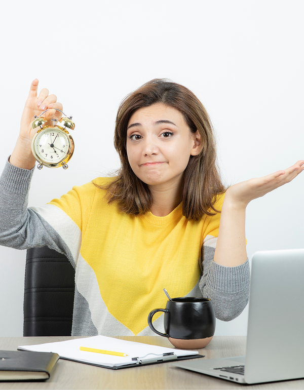 Woman with alarm clock